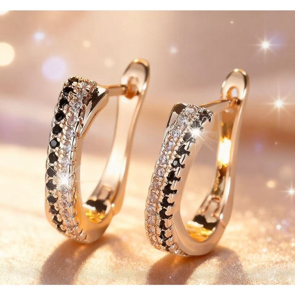 Polished U-drop earrings featuring an open hollow core.